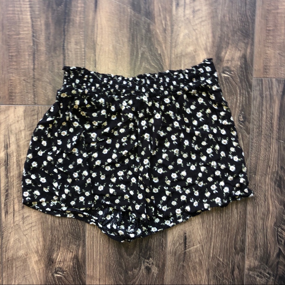 Out from under floral lounge shorts